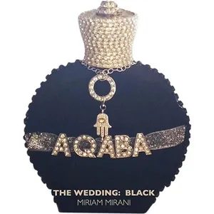 Aqaba The Wedding: Black perfume bottle