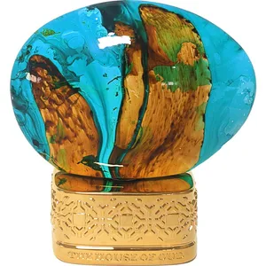 The House of Oud Turquoise perfume bottle