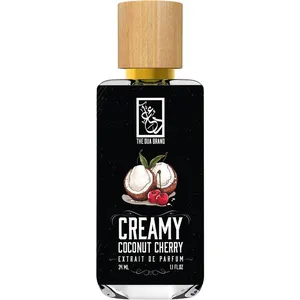 The Dua Brand Creamy Coconut Cherry perfume bottle