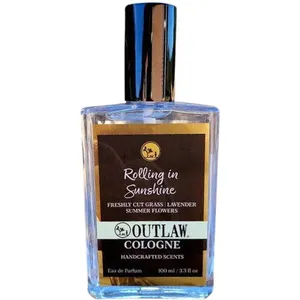 Outlaw Soaps Rolling in Sunshine perfume bottle