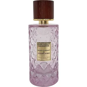 Indulgent Moments Black Currant & Golden Amber parfüm şişesi