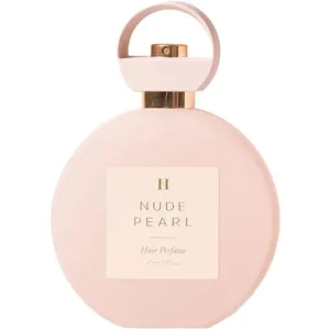 Her lip to BEAUTY Nude Pearl (Hair Perfume) perfume bottle