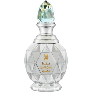 Ajmal Mukhallat Dahn Al Oudh Al Muattaq Silver Jubilee perfume bottle