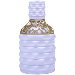 Burgundy Divine Nectar perfume bottle