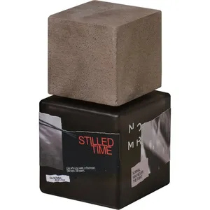 NOMR Stilled Time parfüm şişesi