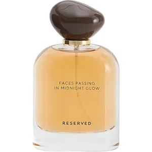 Reserved Faces Passing in Midnight Glow perfume bottle