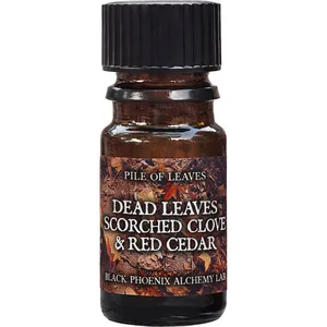 Black Phoenix Alchemy Lab Dead Leaves, Scorched Clove, and Red Cedar perfume bottle
