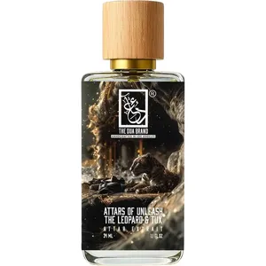 The Dua Brand Attars of Unleash the Leopard & Tux parfüm şişesi
