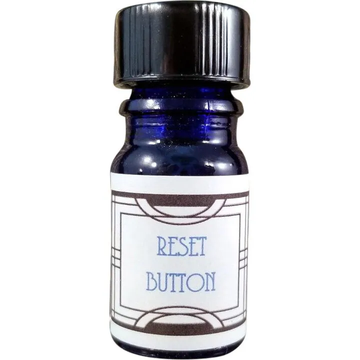 Nui Cobalt Designs Reset Button perfume bottle