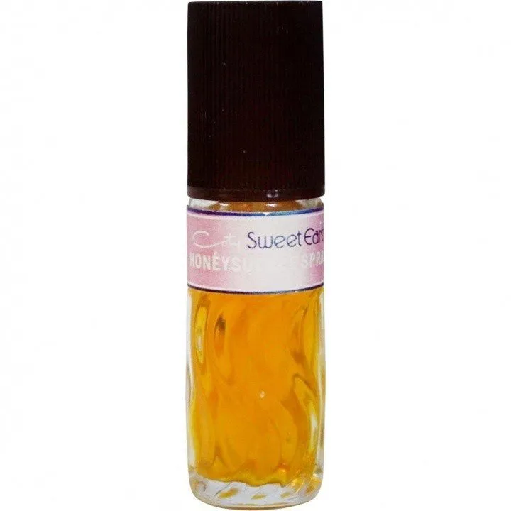 Coty Sweet Earth Honeysuckle parfüm şişesi