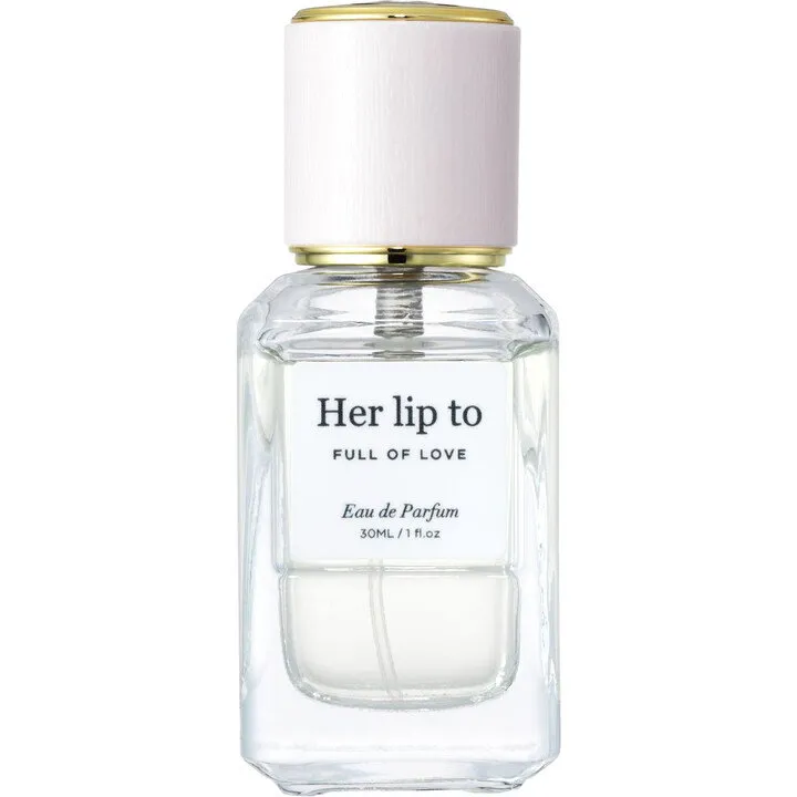 Her lip to BEAUTY Full of Love perfume bottle