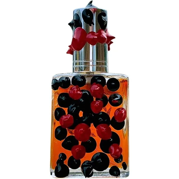 Love Creates Death Under the Rose Bush into the Safari perfume bottle