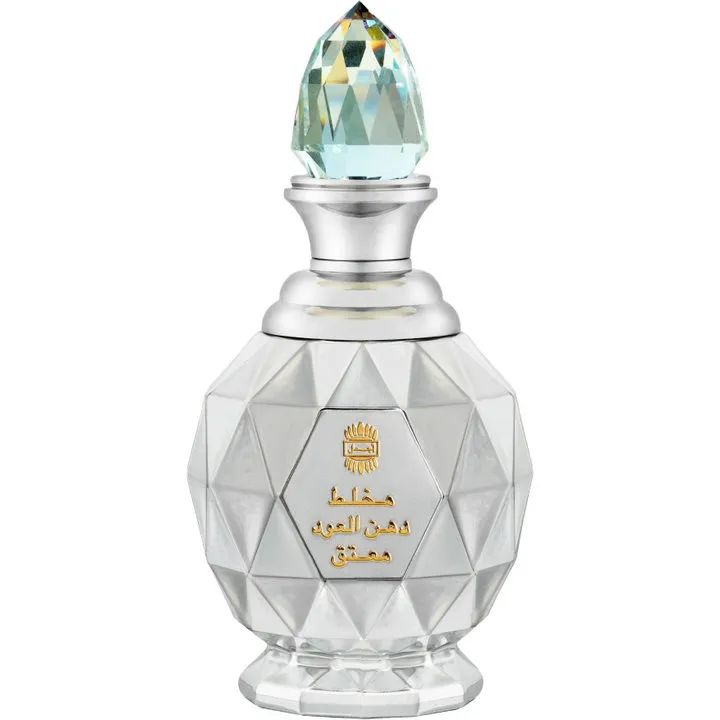 Ajmal Mukhallat Dahn Al Oudh Al Muattaq Silver Jubilee parfüm şişesi